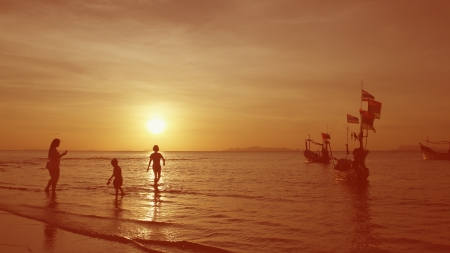 Familly relax while sunset by the beach,vintage styleの写真素材