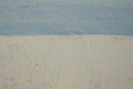 White beach sand textured useful for backgroundの写真素材