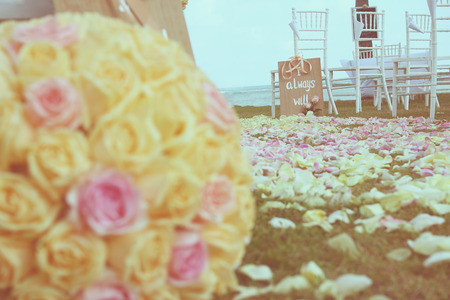 Vintage roses bouquet arrange for wedding decoration in gardenの写真素材