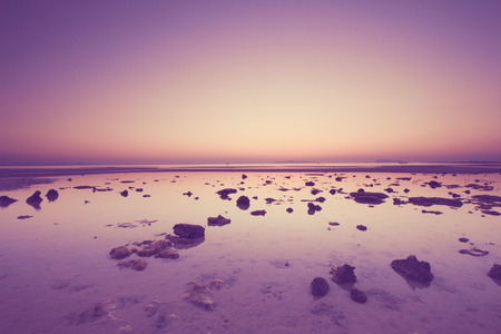 dramatic tropical sunset sky and sea with vintage filterの写真素材