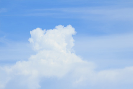 Blue sky and big white cloud backgroundの写真素材