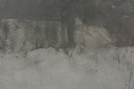 Old cracked cement wall texture backgroundの写真素材