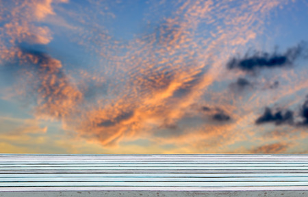 Vintage wood plank with blue sky cloud backgroundの写真素材