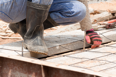 Worker sit on construction siteの写真素材