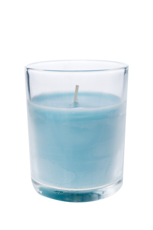 A blue candle glass isolated on white backgroundの写真素材