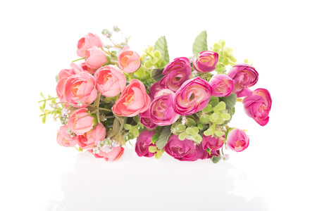 Beautiful artificial red rose bouquet isolated on white background