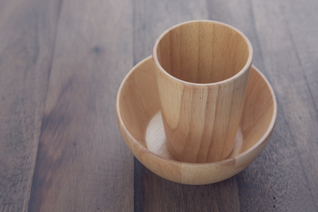 Wood kitchen utensils over grunge wooden table backgroundの写真素材