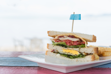 Sandwich ham cheese on vintage wooden table backgroundの写真素材
