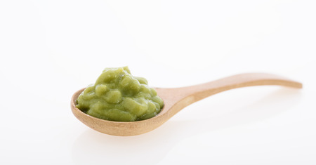 Kaffir lime,Bergomot on wood spoon isolated over white background,Hair spa treatmentの写真素材