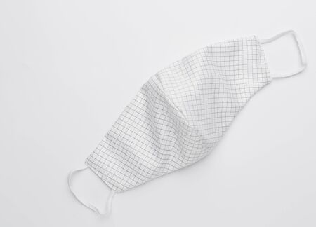 Fabric cloth mask water proof  for people use to protect from corona virus,dust  or pm.2.5 on white backgroundの写真素材