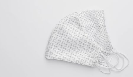 Fabric cloth mask water proof  for people use to protect from corona virus,dust  or pm.2.5 on white backgroundの写真素材