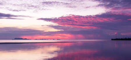 Panoramic tropical  purple sea sky sunset with golden light background ,long exposure
