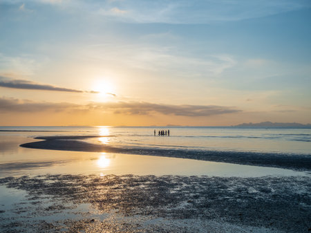 Sunset dramatic blue sky orange clouds backgroundの写真素材