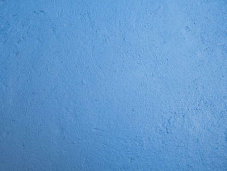 Blue painted cement wall, brush paint concrete wall texture, decorative rustic coatingbackgroundの写真素材