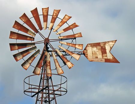 Old oxidized iron windmill in Majorca (Spain)                                                               の写真素材