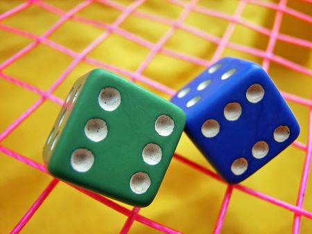 Green and blue dice used in games