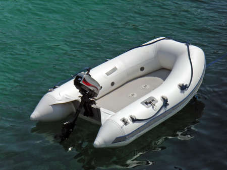 White inflatable boat on the sea water                                                               の写真素材