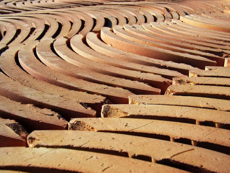 Adobe tiles stacked ready to be installed on a roof                                                               の写真素材