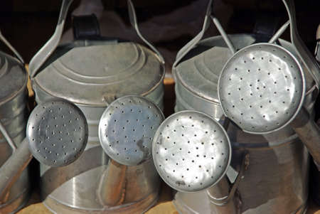watering cans made of tin in an Spanish Tinware