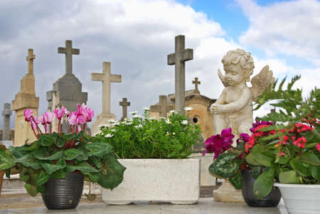 Statue in the cemetery of Alcudia (Majorca - Balearic Islands)の写真素材