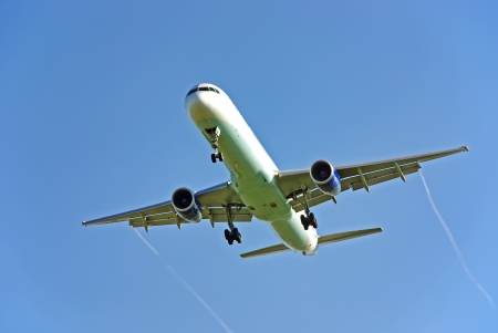 Passenger aircraft arriving to the airportの写真素材