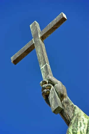 Christian cross over an sky backgroundの写真素材