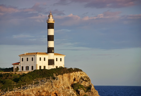 Punta de ses Crestes lighthouse in Porto Colom (Majorca - Spain)の写真素材