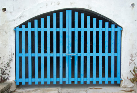 Old Cyan Wooden Door of a boat shelter in the Mediterranean Sea (Majorca)の写真素材