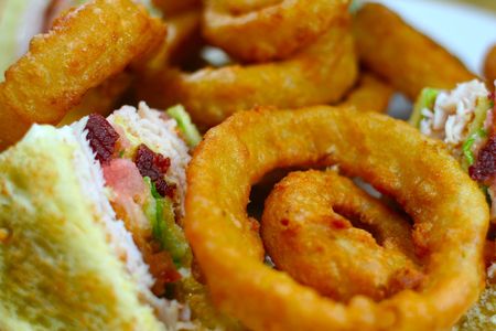 Turkey Bacon Club with Onion Ringsの写真素材