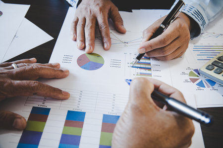 Business team collaboration discussing working analyzing with financial data and marketing growth...