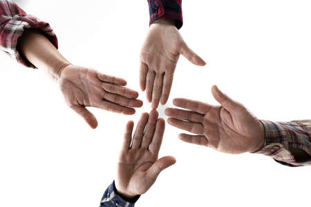 group of like-minded people cupping their palms together