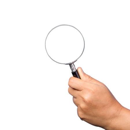 woman hand holding magnifying glass isolated on white background. optical zoom lens is macro tool, concept for education, science.の写真素材