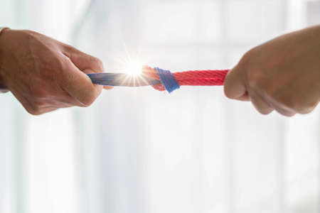 Teamwork businessman team, team people hold rope partnership, cooperation, concept.の写真素材