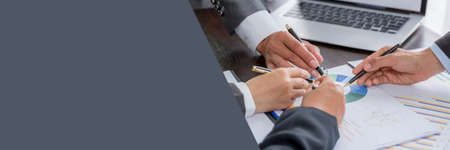 Banner of Group professional business people person working together analyze in office, work together to discuss company financial statistics report, brainstorm ideas graph datum documents on table.の写真素材