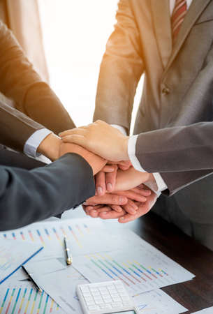 Close-up of group hand success business people person working together in office. Diversity of businessman and businesswoman attending corporate meetings. concept of friendship, cooperation corporate.の写真素材