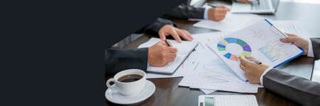 Banner of Group professional business people person working together analyze in office, work together to discuss company financial statistics report, brainstorm ideas graph datum documents on table.の写真素材
