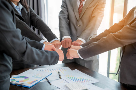 Close-up of group hand success business people person working together in office. Diversity of businessman and businesswoman attending corporate meetings. concept of friendship, cooperation corporate.の写真素材