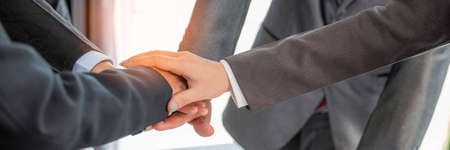 Banner of group hand success business people person working together in office. Diversity of businessman and businesswoman attending corporate meetings. concept of friendship, cooperation corporate.の写真素材