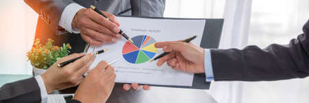 Banner of Group professional business people person working together analyze in office, work together to discuss company financial statistics report, brainstorm ideas graph datum documents on table.の写真素材
