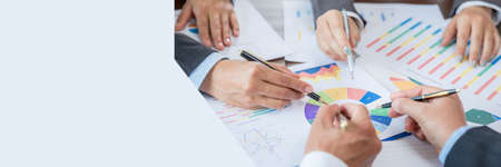 Banner of Group professional business people person working together analyze in office, work together to discuss company financial statistics report, brainstorm ideas graph datum documents on table.の写真素材