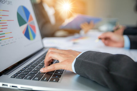 Group professional business people person working together to analyze in office, work together to discuss company financial statistics report, brainstorm ideas, and graph datum documents on the table.の写真素材