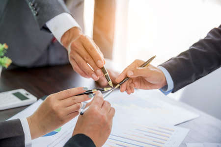 Close-up of group hand success business people person working together in office. Diversity of businessman and businesswoman attending corporate meetings. concept of friendship, cooperation corporate.の写真素材