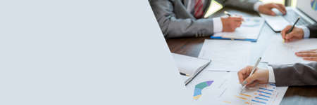 Banner of Group professional business people person working together analyze in office, work together to discuss company financial statistics report, brainstorm ideas graph datum documents on table.の写真素材