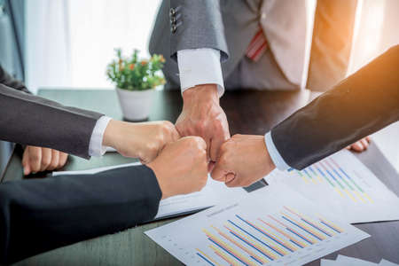 Close-up of group hand success business people person working together in office. Diversity of businessman and businesswoman attending corporate meetings. concept of friendship, cooperation corporate.の写真素材