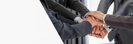 Banner of group hand success business people person working together in office. Diversity of businessman and businesswoman attending corporate meetings. concept of friendship, cooperation corporate.の写真素材