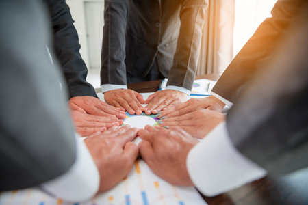 Close-up of group hand success business people person working together in office. Diversity of businessman and businesswoman attending corporate meetings. concept of friendship, cooperation corporate.の写真素材