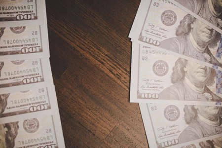 close up many banknote 100 us dollar - american currency, bill cash money background, concept for finance bank, success business investment, wealth rich, savingの写真素材