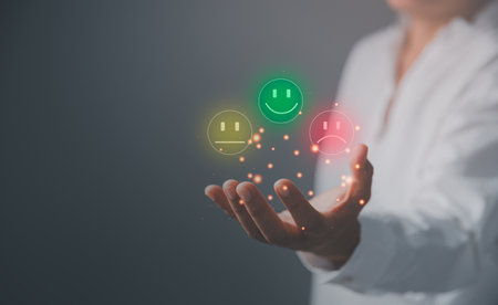 Business are holding smile emotion, raising their rank or raising the highest ratings, best assessment and ranking idea. Customer service and Satisfaction concept, rating very impressed.の写真素材