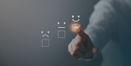 Customer service and Satisfaction concept, Business person are touching the virtual screen on happy Smiley face icon to give satisfaction in service. rating very impressed. customer service feedback.の写真素材