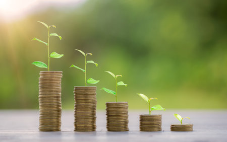 Money coin stack growing graph for saving concept. business finance and saving money investment, plant growing up on coin. Balance savings and investment. save retirement for interest ideaの写真素材